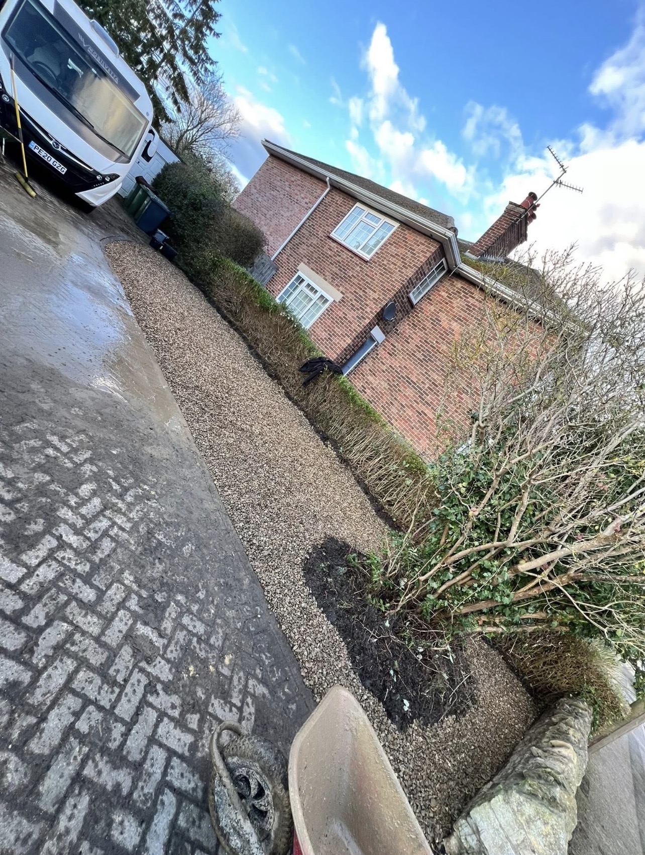 Cleared & gravelled front — after